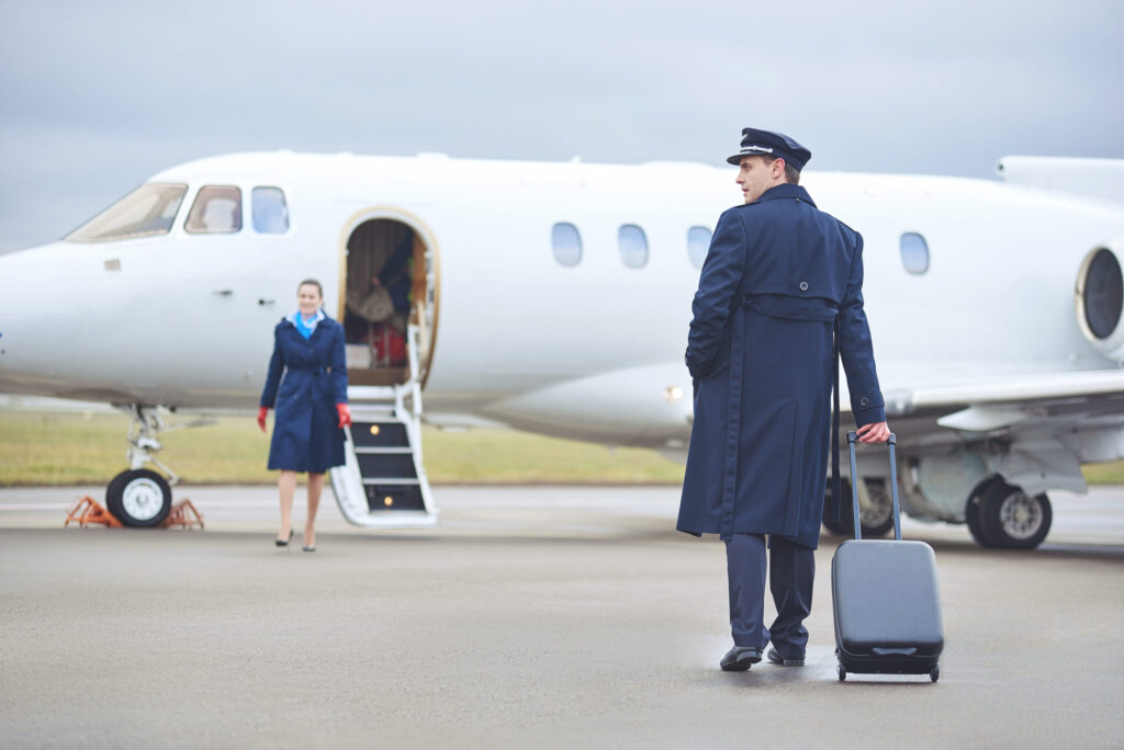 Pilot Captain boarding airplane.